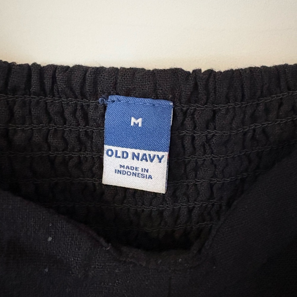 Old Navy black midi dress with smocking on back. 46” from shoulder to hem.